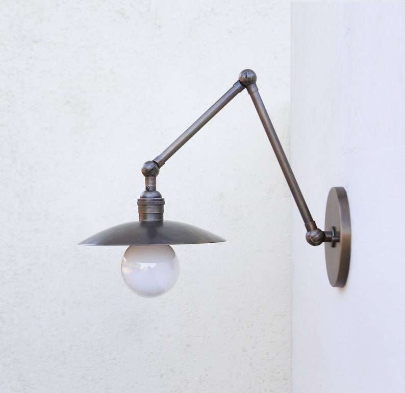 brass adjustable wall sconce Swivels Adjustable 8" Wide Brass Round Shade Sconce - view 1