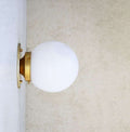 Hand-Blown Frost Matte Globe Shade Minimalist Brass Globe Sconce - view 1