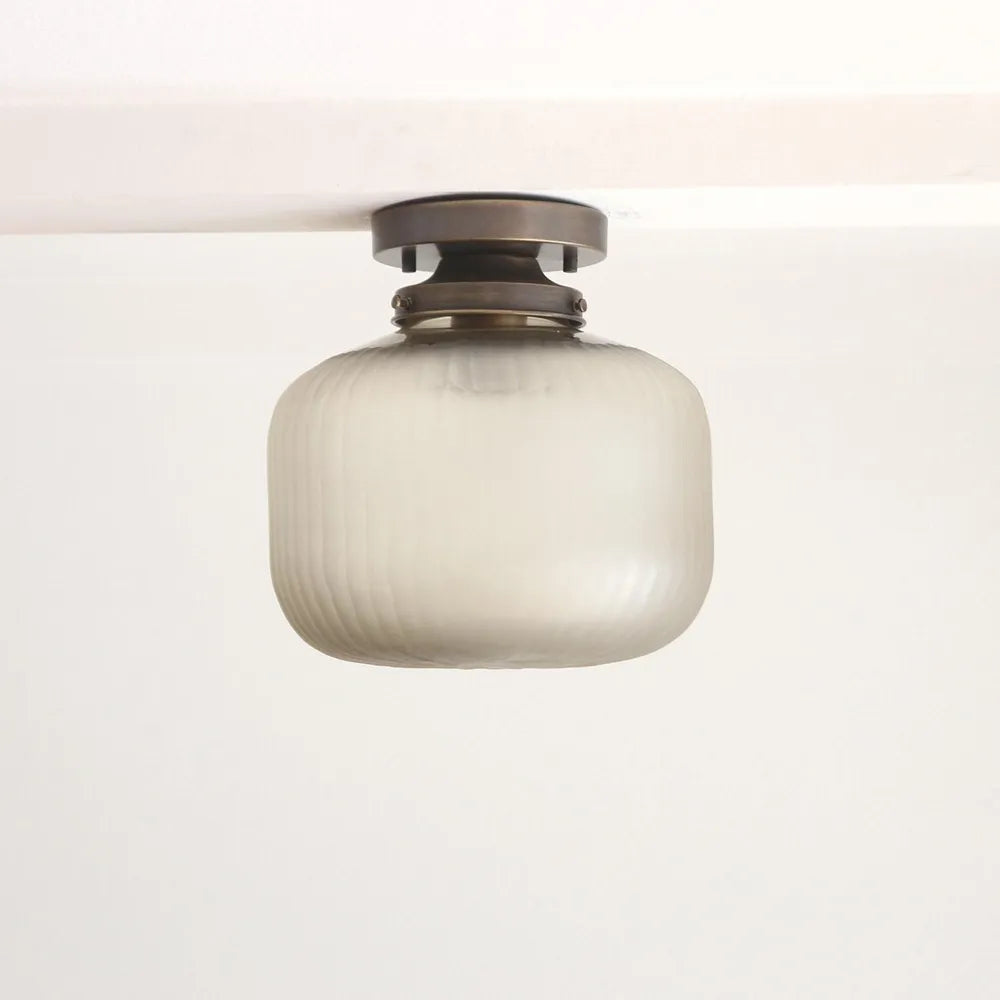 Contemporary Brass Flush Mount Ceiling Light with Textured Glass Shade - view 1