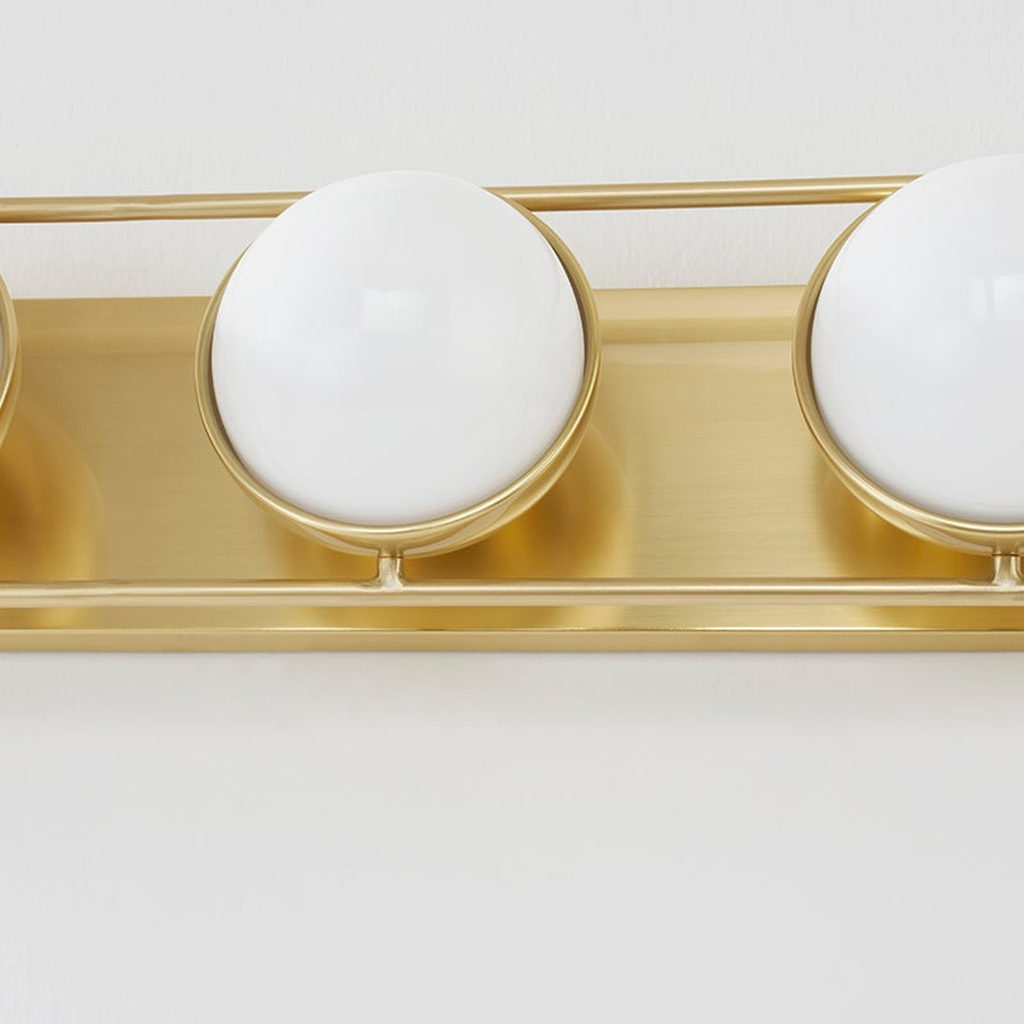 Lyra Aged Brass Globe Vanity Sconce - Warm Ambient Bathroom Light - view 15